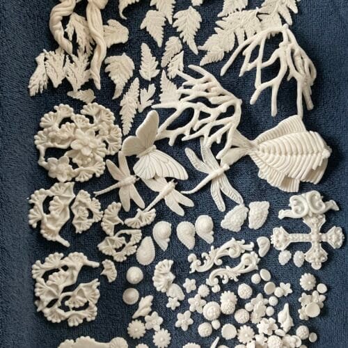 Fired appliqués ready for assembly.