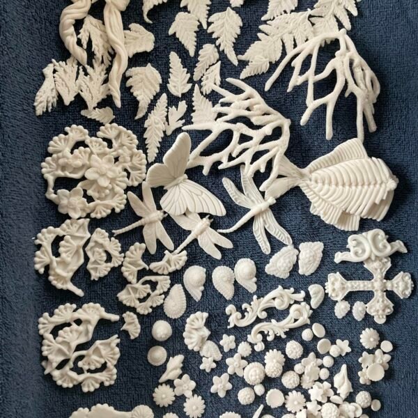 Fired appliqués ready for assembly.